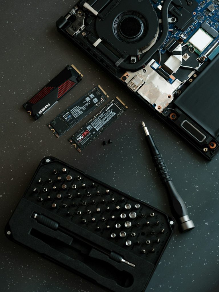 a-laptop-with-a-keyboard-and-a-camera-on-top-of-it-adx4pf9seem