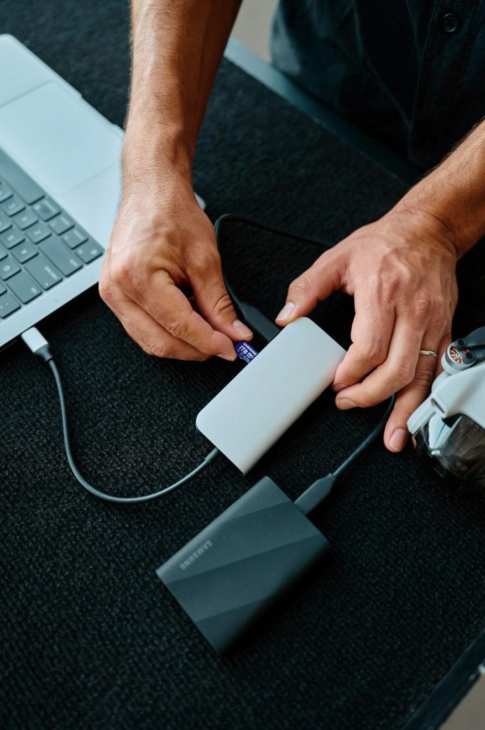 a-man-is-working-on-a-laptop-computer-zerhmpq-kd4